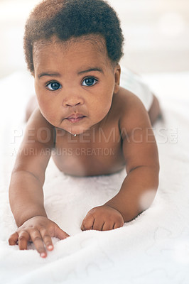 Buy stock photo Cute baby, black kids and portrait of crawling on bed for play, fun and relax in nursery room. Young african infant child, girl and face of healthy development, growth and learning to crawl in house 