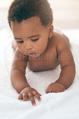 Buy stock photo Girl, lying and kids with a black baby in a home, towel on the floor for growth or child development. Relax, children and family home with a newborn infant playing in the living room of a house