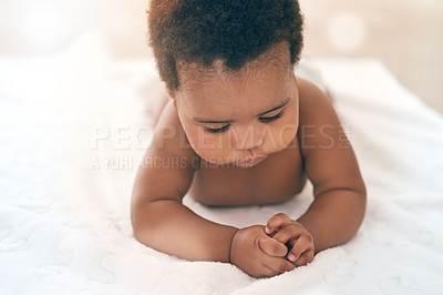 Buy stock photo Girl, blanket and kids with a black baby in a home, lying on the floor for growth or child development. Relax, children and family home with a newborn infant playing in the living room of a house
