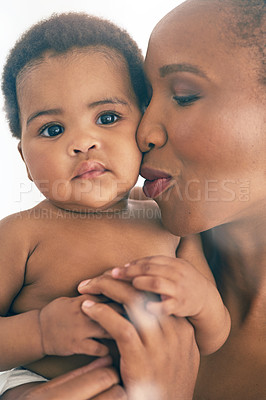 Buy stock photo Black woman with baby, face and hug with family, content and bonding with love and early childhood and happiness. African female, mother holding child with parenting, motherhood and cuddle with care