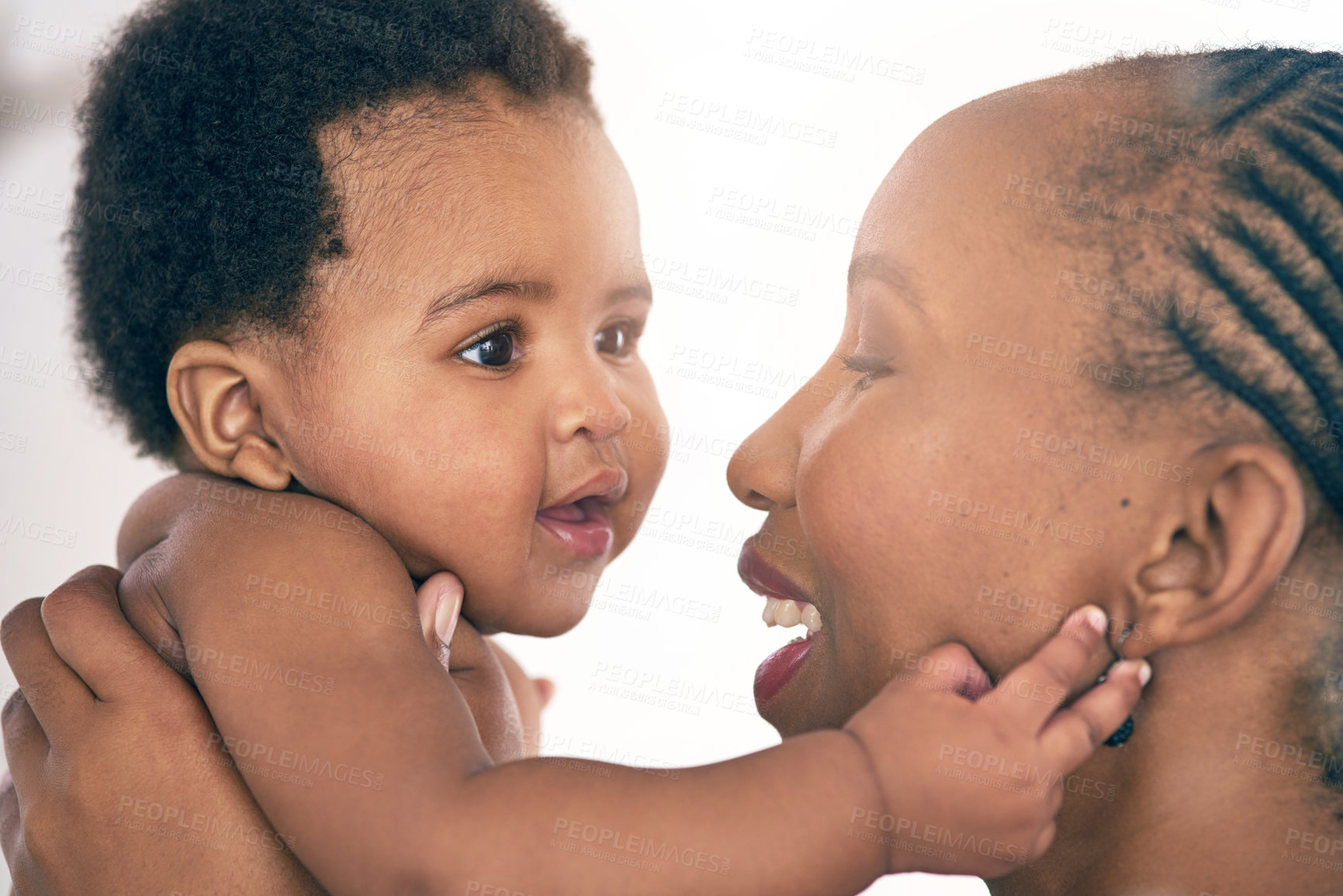 Buy stock photo Shot of a mother bonding with her adorable baby girl