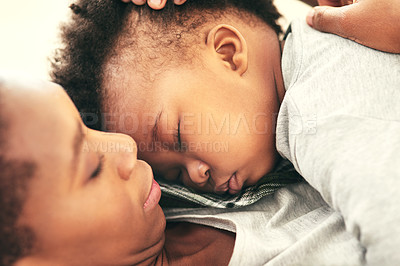 Buy stock photo Shot of a mother cradling her little baby boy