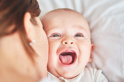 Buy stock photo Shot of an adorable baby boy bonding with his mother at home