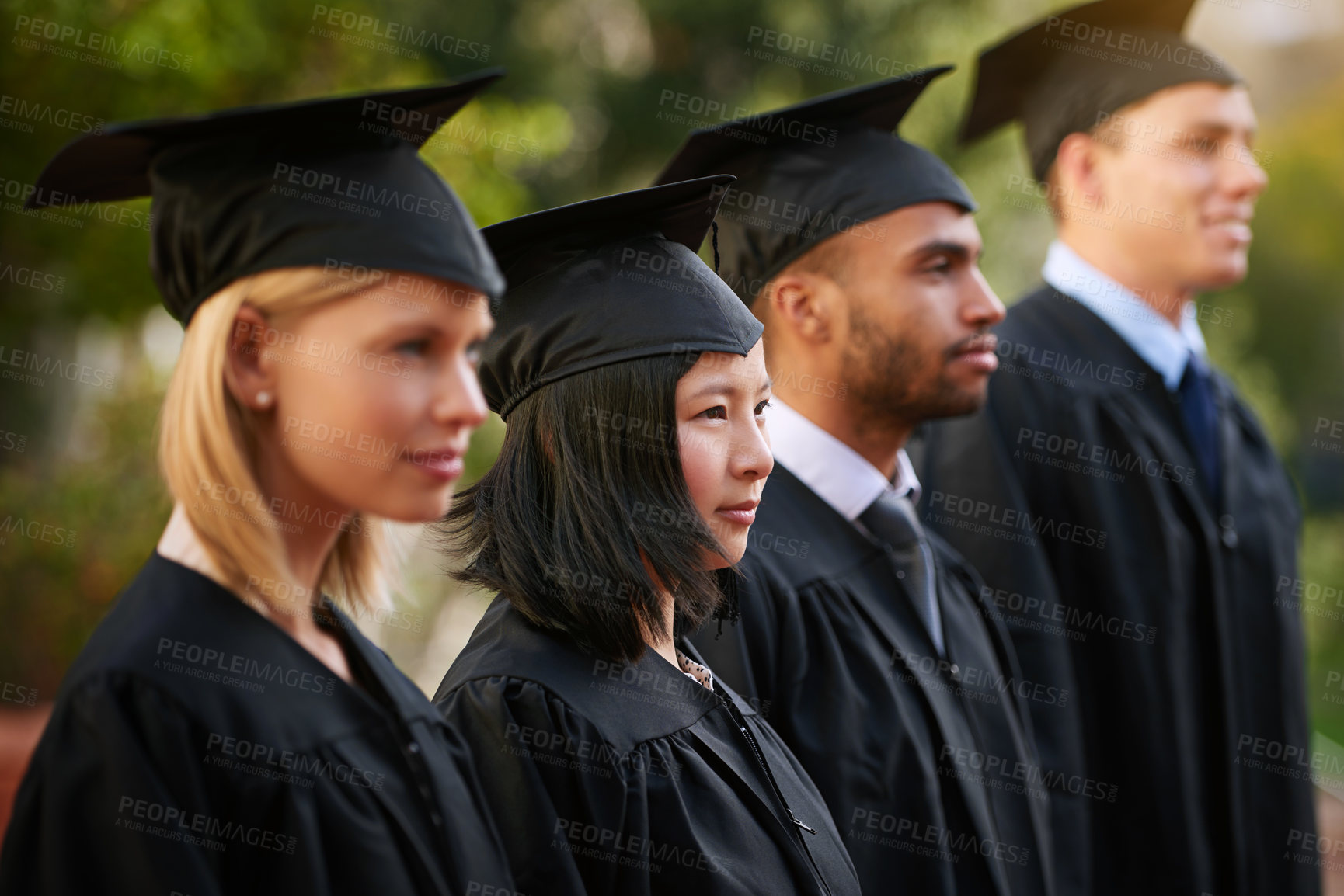 Buy stock photo Face, graduation and woman student in line with friends at outdoor ceremony for college or university. Education, scholarship or achievement with graduate men and women at academic school event