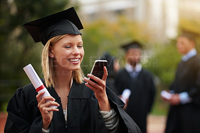 Buy stock photo Graduation, certificate and phone with student woman outdoor on campus for university or college event. Mobile, communication and smile with young graduate at school for education or scholarship