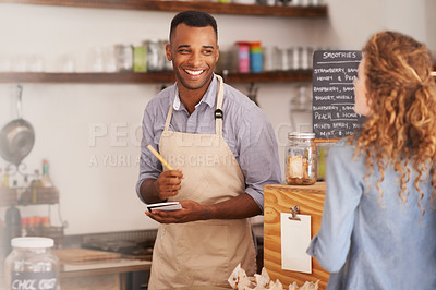 Buy stock photo Customer, cafe and waiter with order at counter for purchase, decision and buying lunch at coffee shop. Woman, small business and male barista with notepad for service, writing and choice on menu