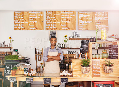 Buy stock photo Black man, portrait and owner with arms crossed in cafe with pride for career or job. Barista, smile and confidence of African person from Nigeria in restaurant, small business and coffee shop.