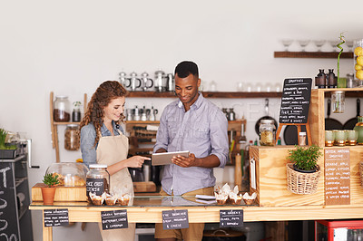 Buy stock photo Restaurant owners, tablet and teamwork of people, manage orders and discussion in store. Waiters, black man and happy woman in cafe with technology for inventory, stock check and managing sales.