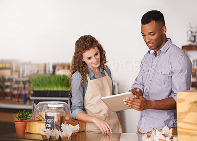 Buy stock photo Tablet, coffee shop owner and teamwork of people, discussion and training. Waiters, black man and happy woman in restaurant with technology for inventory, stock check or managing sales in store.