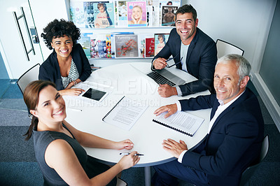 Buy stock photo Portrait of a group of businesspeople sitting together in an office