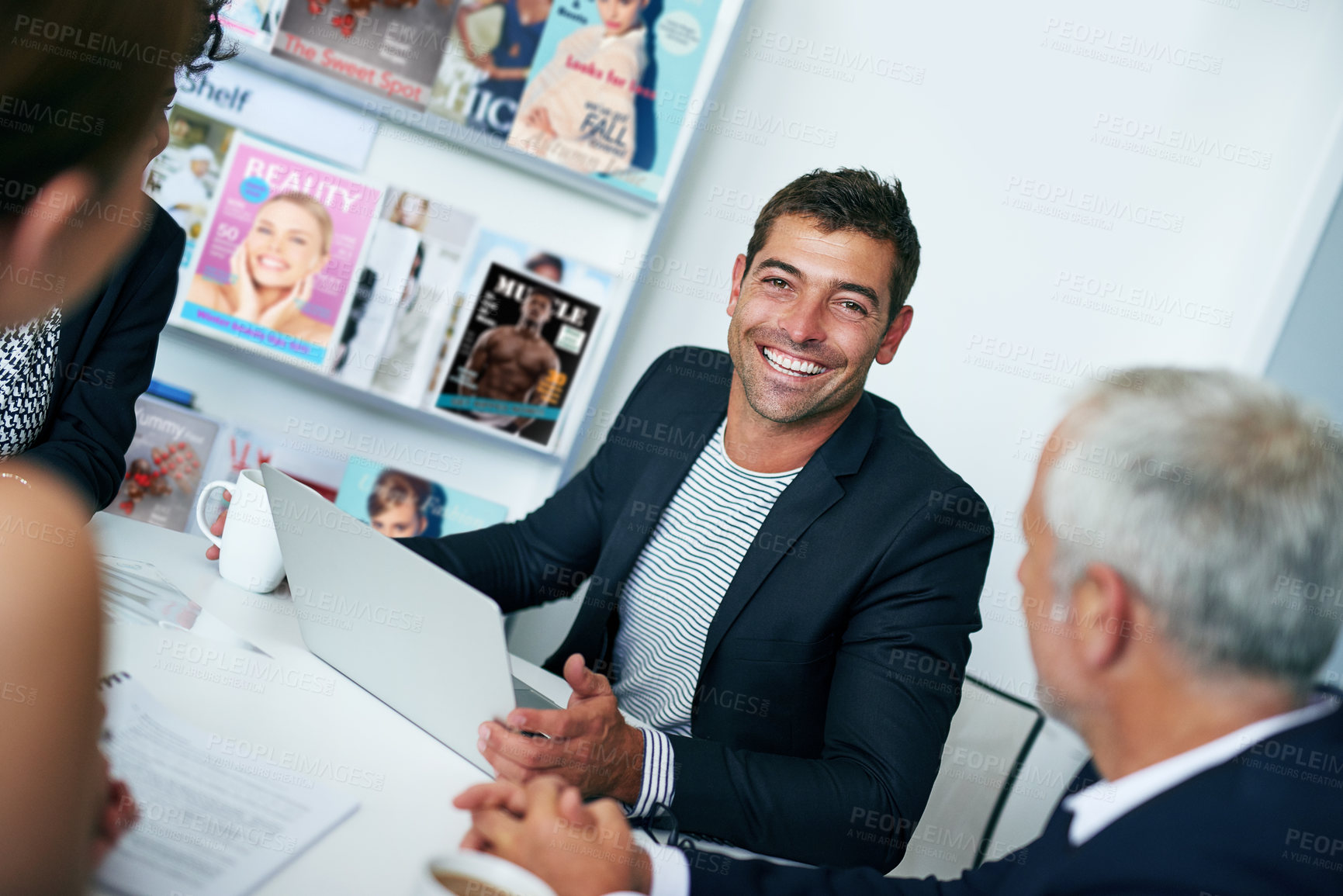 Buy stock photo Office, smile and meeting in boardroom, group and discussion with laptop, paperwork and man. Corporate, talking and ideas with documents, publicist and planning for campaign and media relations