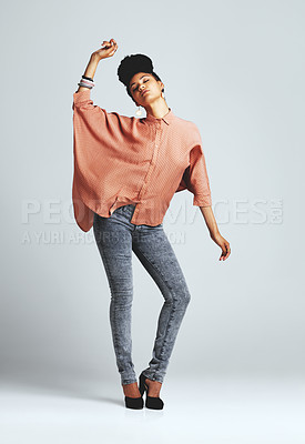 Buy stock photo Shot of a fashionable young woman wearing a casual outfit