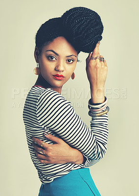Buy stock photo Shot of a fashionable young woman posing in the studio
