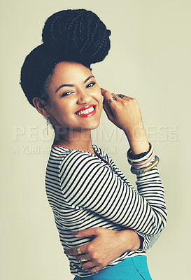 Buy stock photo Shot of a fashionable young woman posing in the studio