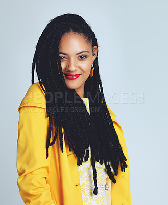 Buy stock photo Studio shot of a fashionable young woman posing against grey background