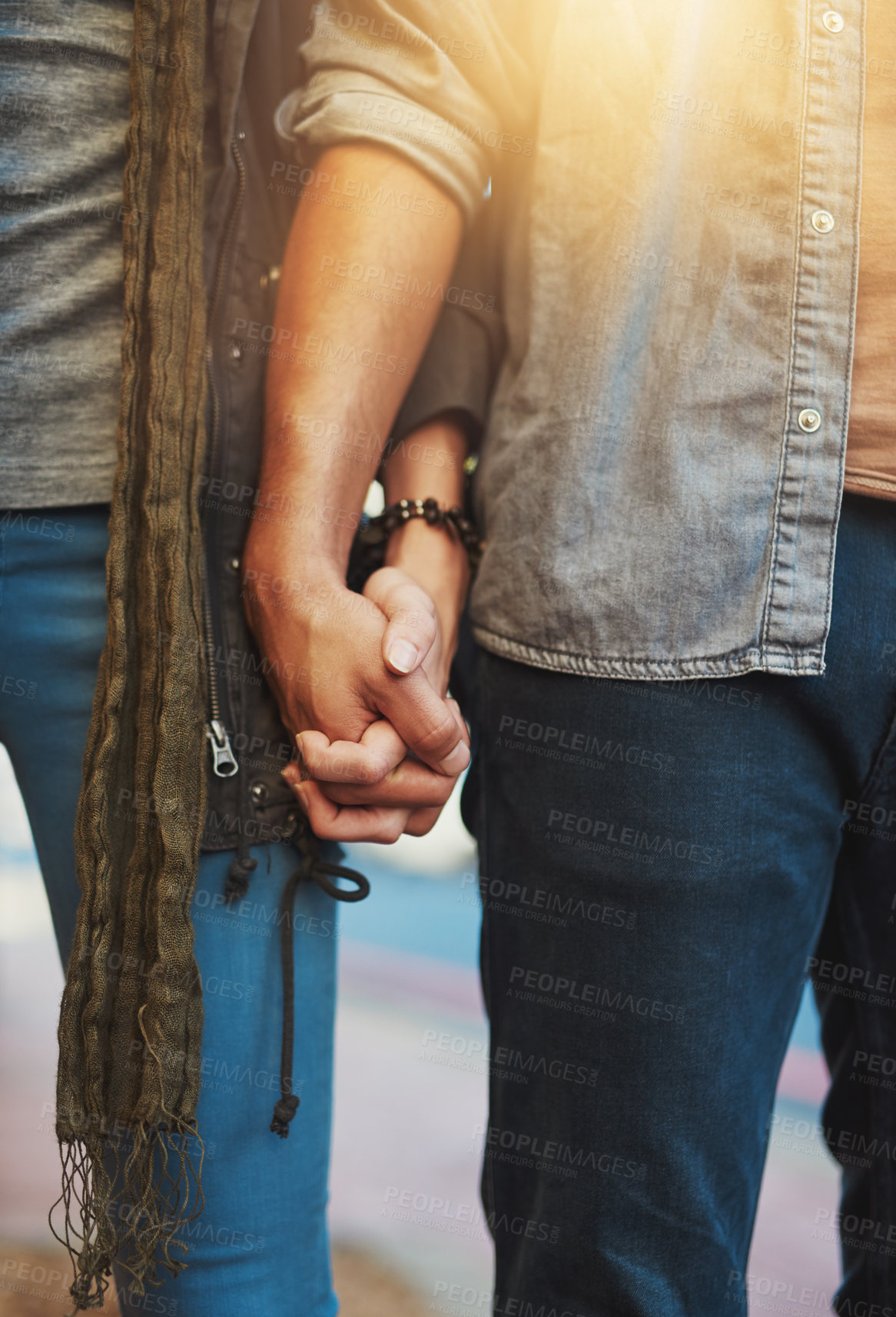 Buy stock photo Closeup shot of a loving couple holding hands