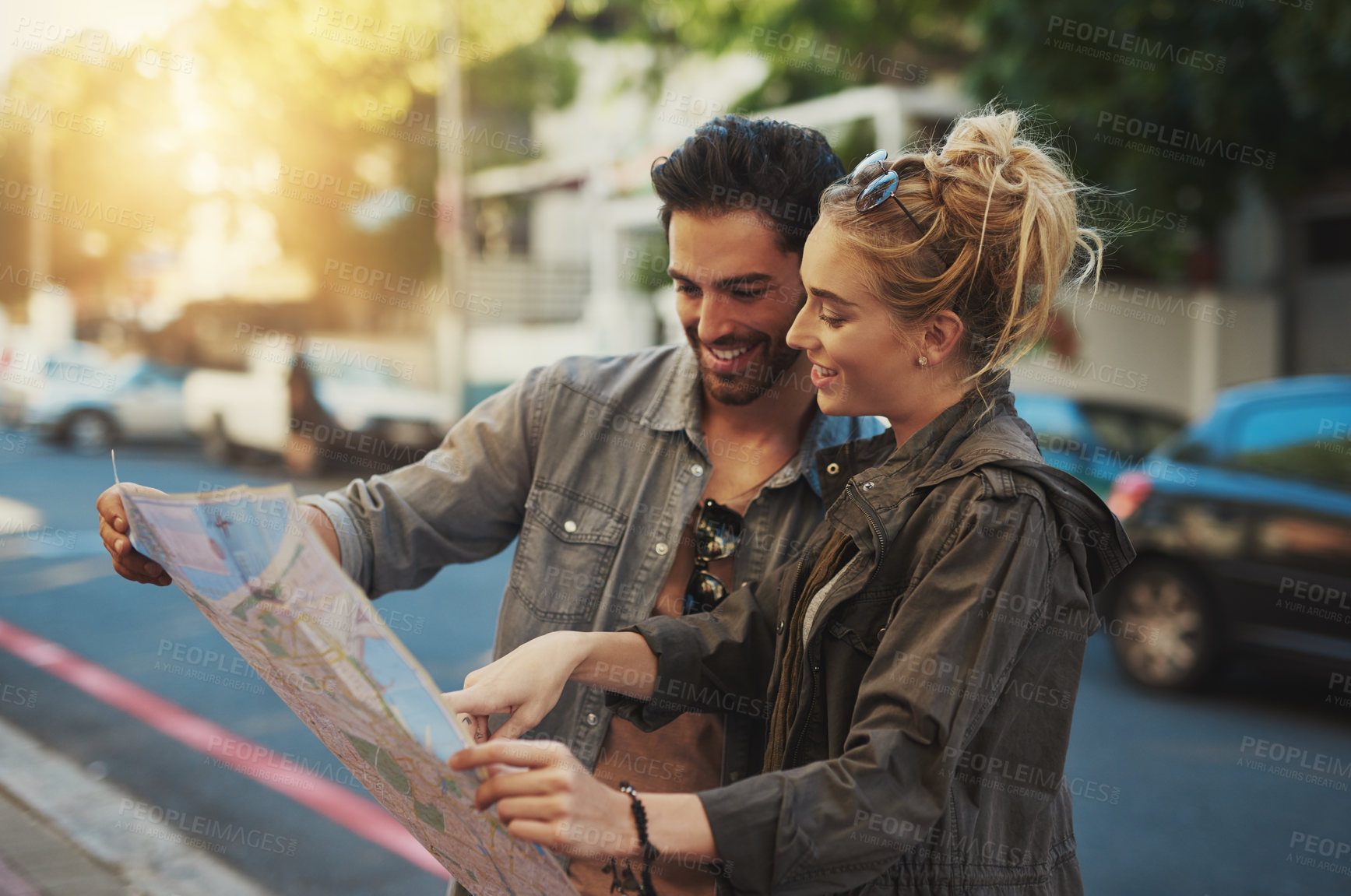 Buy stock photo Outdoor, couple and map for reading, search and location navigation in city of London. Dating people, man and woman with paper for guidance, hotel direction and instructions for vacation together