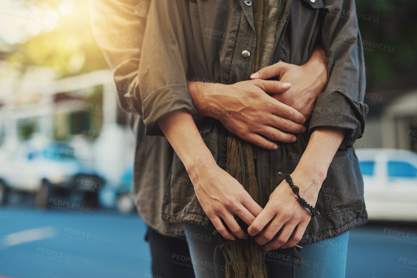 Buy stock photo Cropped shot of an affectionate couple in the city