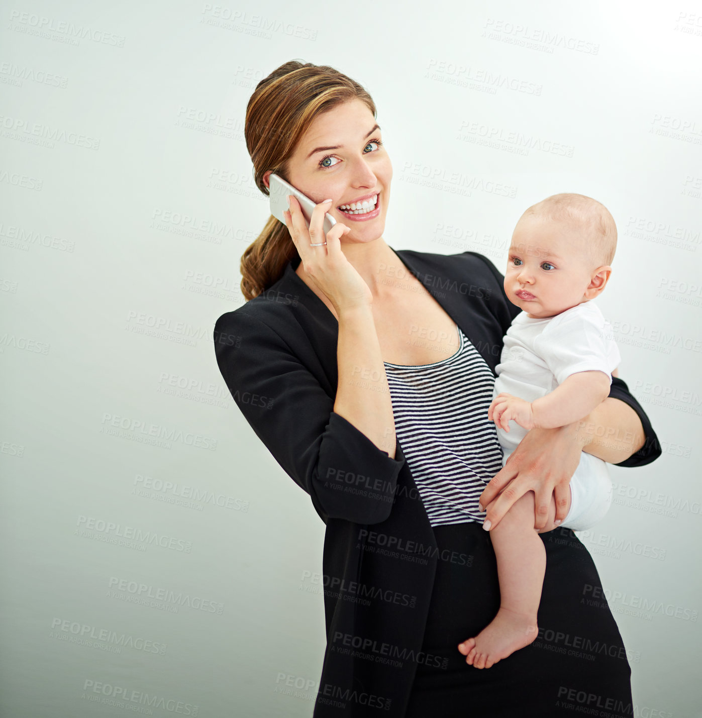 Buy stock photo Phone call, portrait and working mom with baby in studio with communication for business proposal. Happy, networking and lawyer multitasking with with cellphone and infant child by white background.