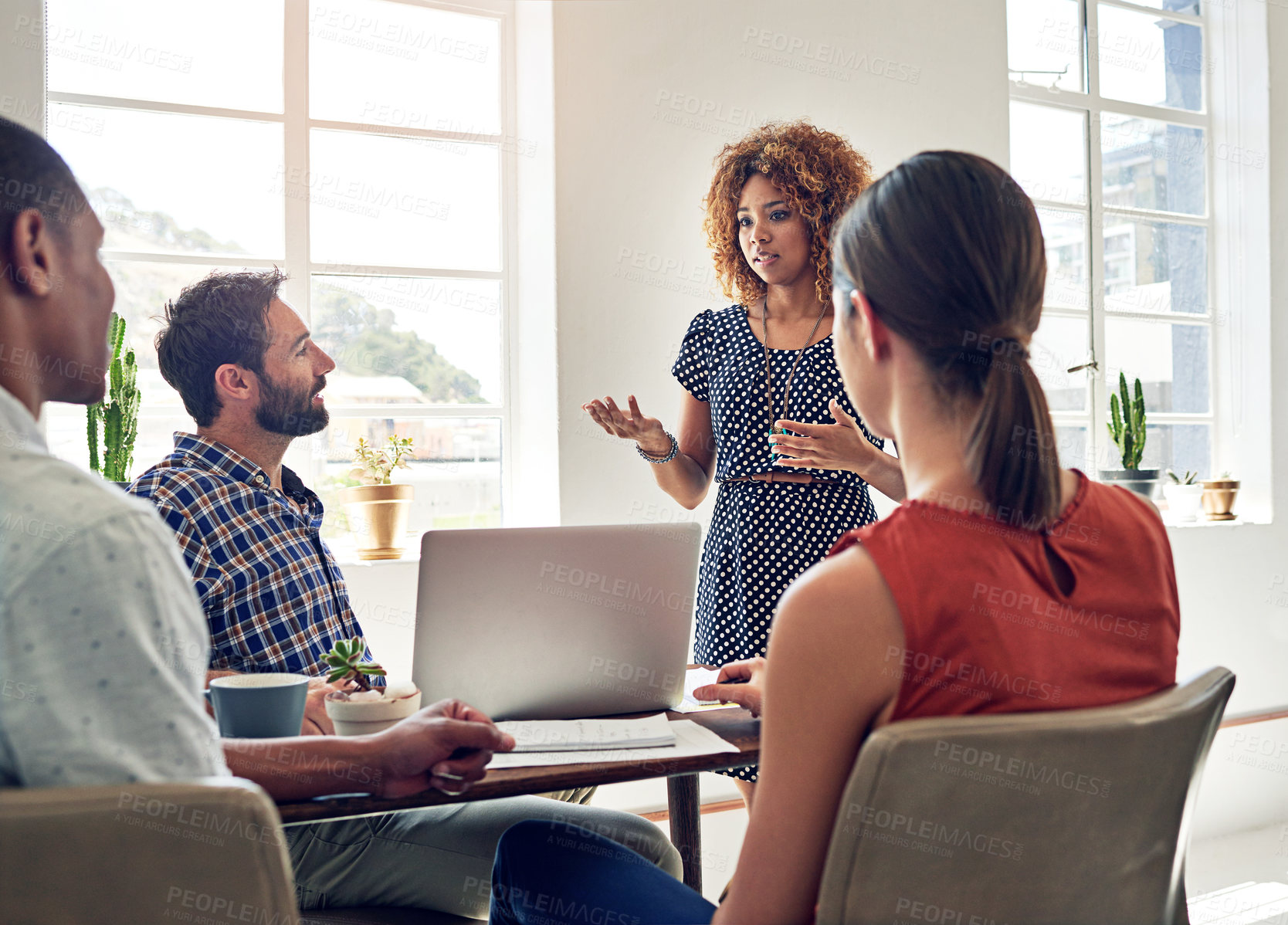 Buy stock photo Shot of a group of colleagues having a meeting in an office