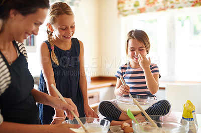 Buy stock photo Mom laughing, happy family or kids baking in kitchen with siblings learning or mixing cookies recipe. Funny, home or mother helping or teaching playful children to bake together for cooking skills 