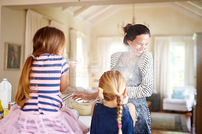 Buy stock photo Mom, playing or children baking in kitchen with messy kids siblings smiling with flour on dirty clothes at home. Smile, happy or parent cooking or teaching fun daughters to bake for child development