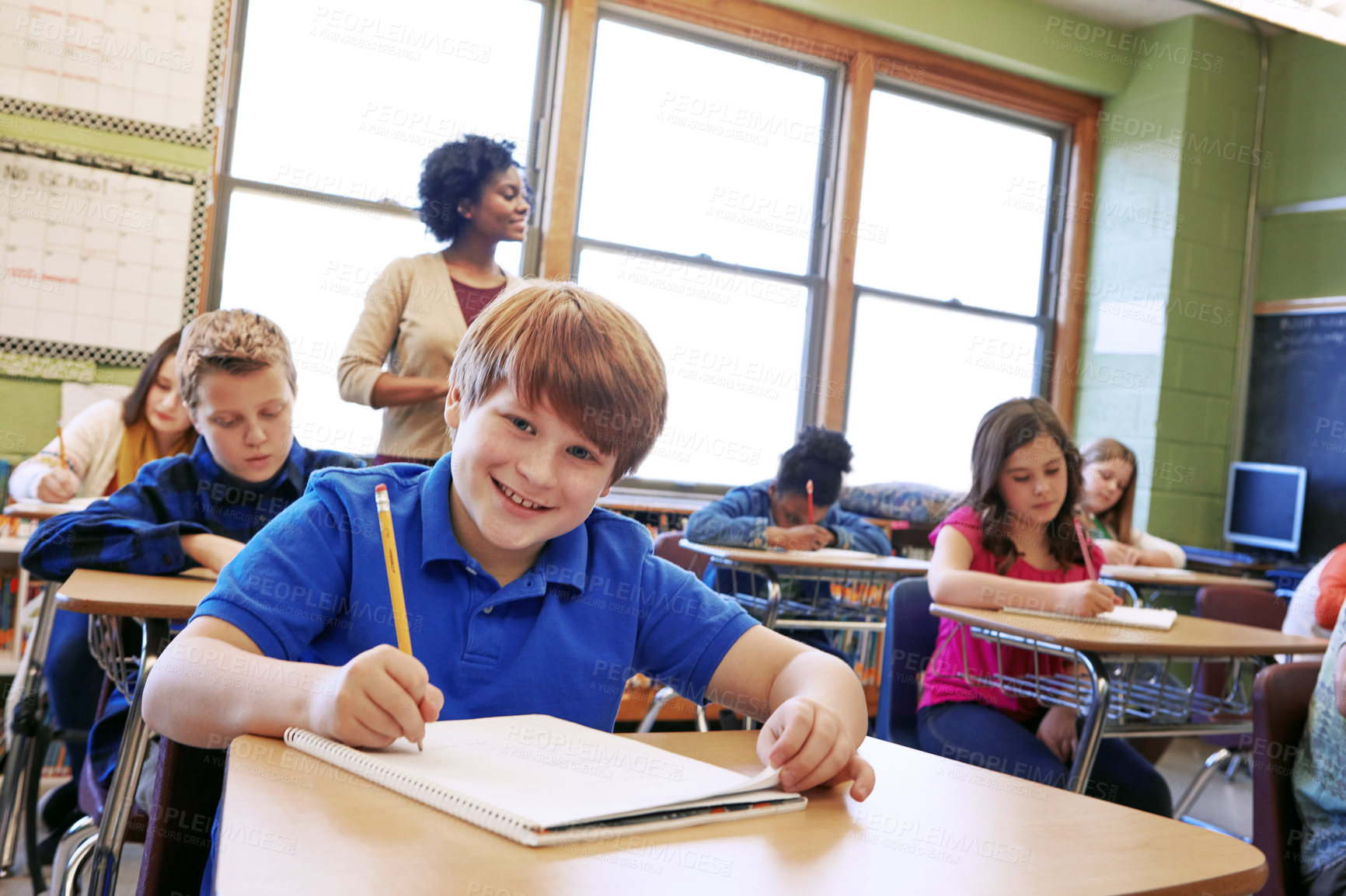 Buy stock photo School, children and education portrait in a classroom while writing to learn, study and gain knowledge. Boy and girl group students in class while learning for future, development and growth