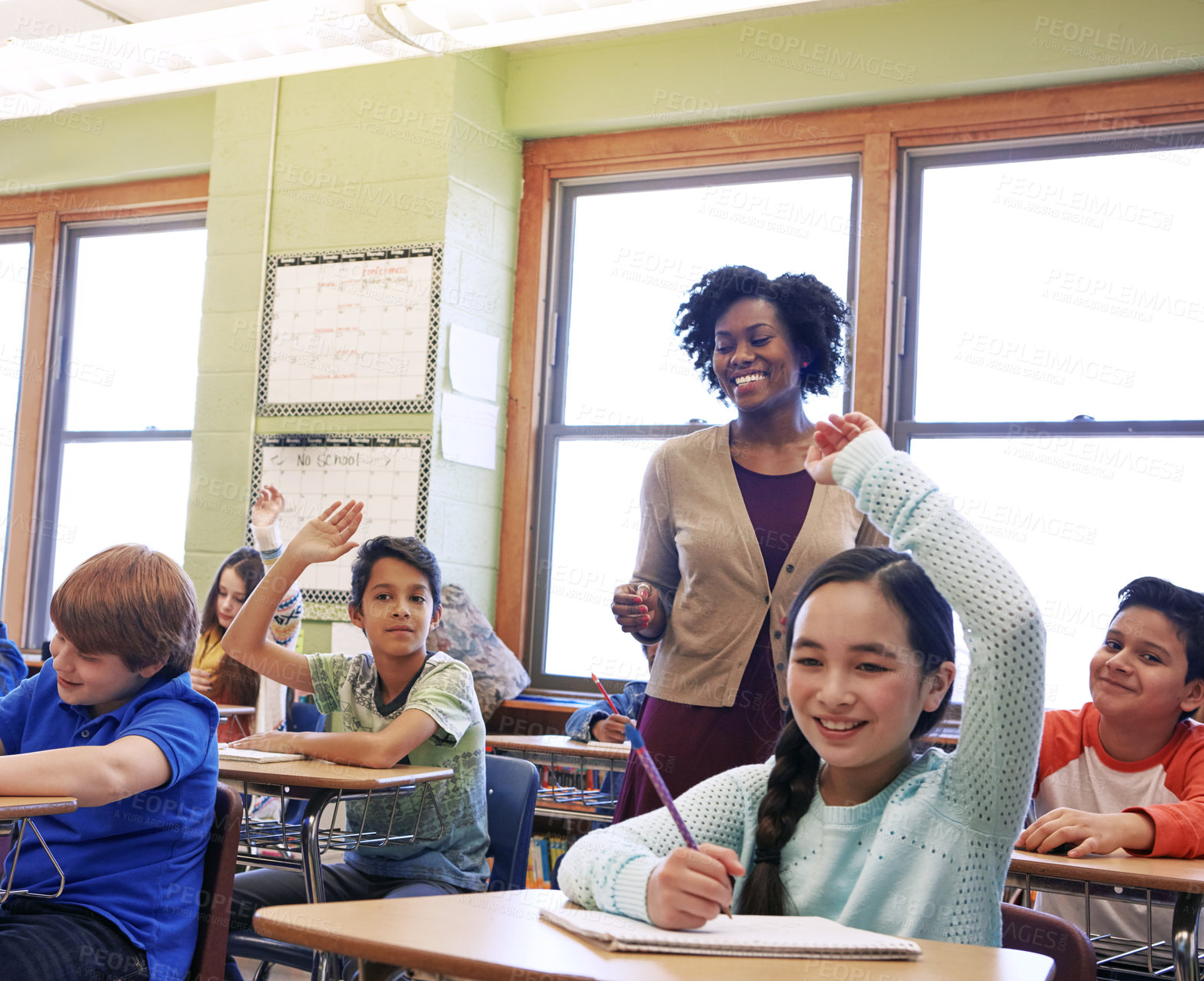 Buy stock photo Education, teacher and kids raise their hands to ask or answer an academic question for learning. Diversity, school and primary school children speaking to their woman educator in the classroom.