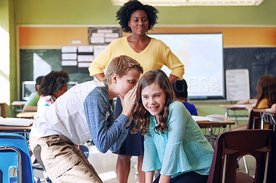 Buy stock photo Students, secret and whisper in classroom with teacher in elementary school. Education, learning and children gossiping, sharing answers or cheating with black woman or educator watching in class.