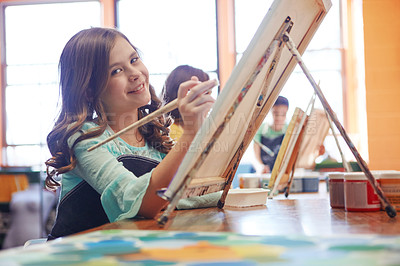 Buy stock photo Shot of a young schoolgirl in an art class