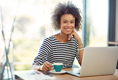 Buy stock photo Portrait of a young woman working on a laptop at home