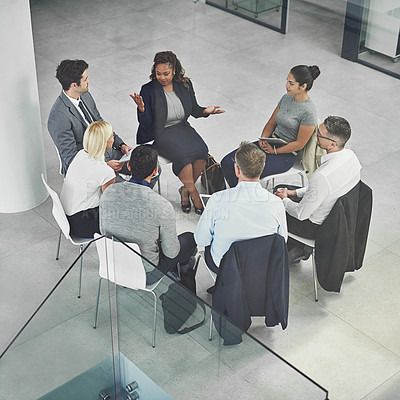 Buy stock photo Above, circle and business people in meeting, planning and teamwork for project, proposal and review. Employees, modern office and coworkers with brainstorming, cooperation and feedback for growth