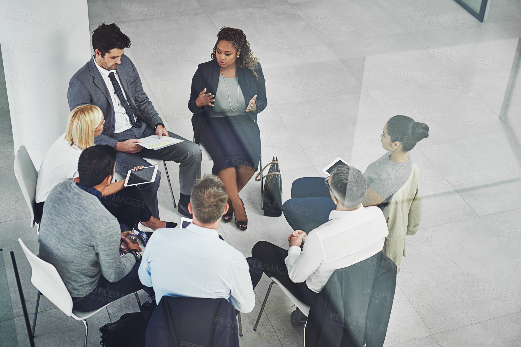 Buy stock photo Above, circle and business people in meeting, feedback and teamwork for project, proposal and review. Employees, modern office and coworkers with brainstorming, cooperation and planning for growth