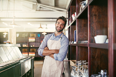 Buy stock photo Cropped portrait of a young barista standing in a coffee shop