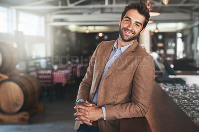 Buy stock photo Portrait, man and business owner of pub, beer and smile of entrepreneur, happiness and joy for bar. Startup, tavern and store for alcohol, person and barrels in shop, confidence and pride for retail