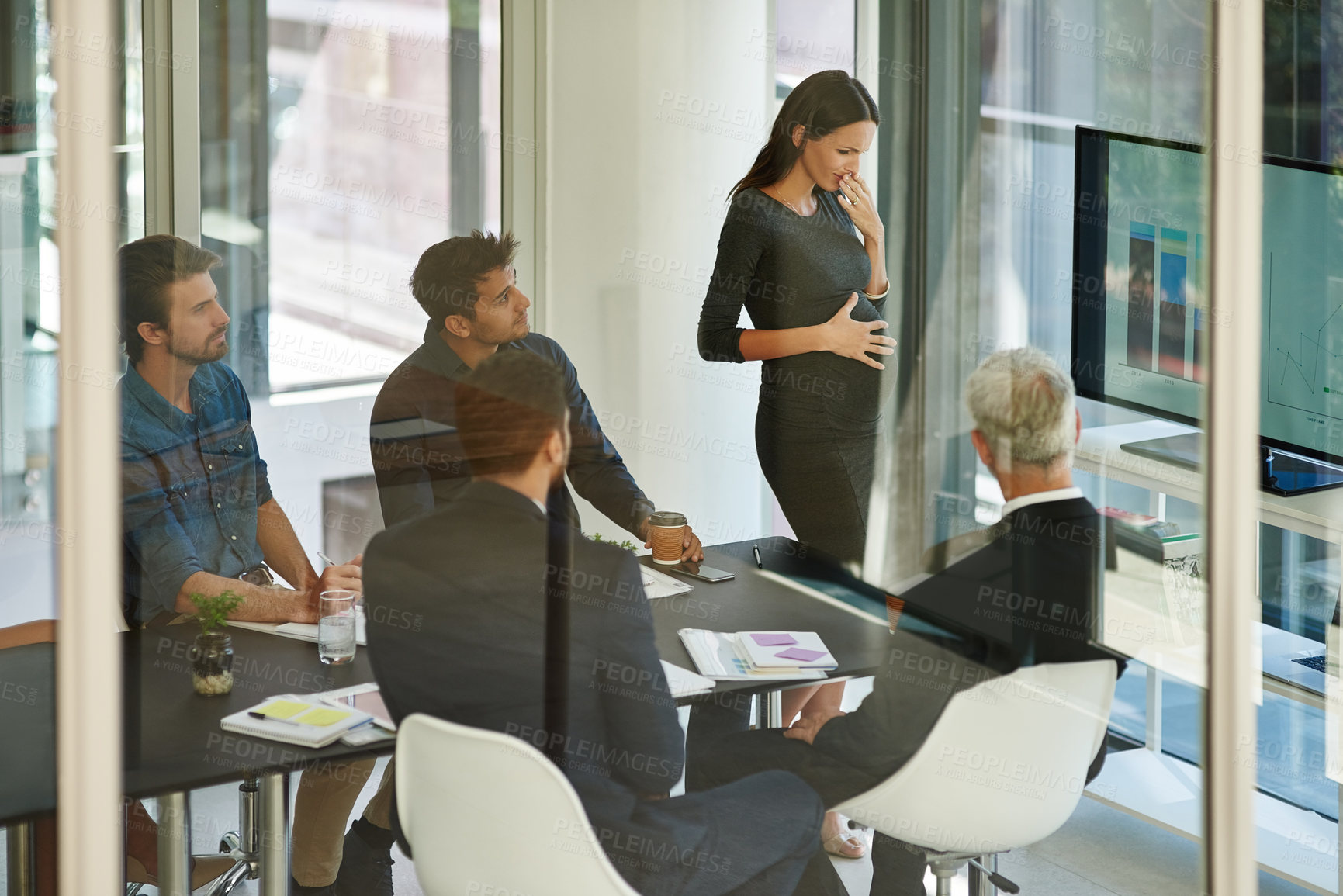 Buy stock photo Pregnancy, woman and nausea in meeting in office with discomfort, emergency and morning sickness. Maternity burnout, business people and budget presentation with uncomfortable bloating and overworked