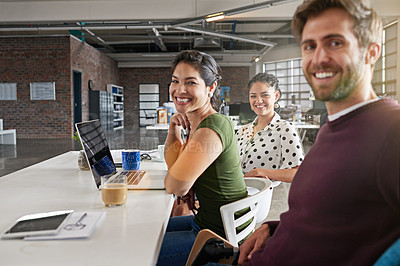 Buy stock photo Shot of a team of colleagues having a meeting in a modern office