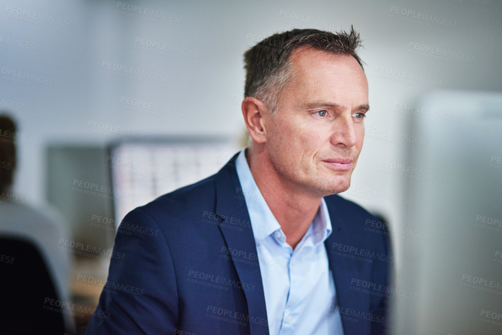 Buy stock photo Cropped shot of a businessman working in the office