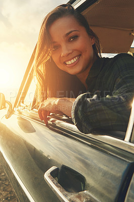 Buy stock photo Portrait, driver and road trip with a black woman in a car at sunset during summer vacation or travel. Nature, window and drive with an attractive young female sitting in transport for adventure