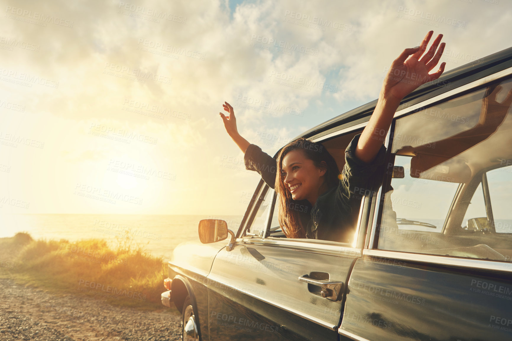 Buy stock photo Happy woman, sunset and road trip with car for freedom, travel or outdoor journey in nature. Female person, tourist or fresh air with smile in vehicle for adventure, transport or vacation by beach