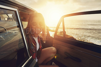 Buy stock photo Happy woman, portrait and sunglasses with beach sunset for road trip, travel or outdoor journey in nature. Female person, tourist or summer holiday with smile in car for adventure by ocean coast