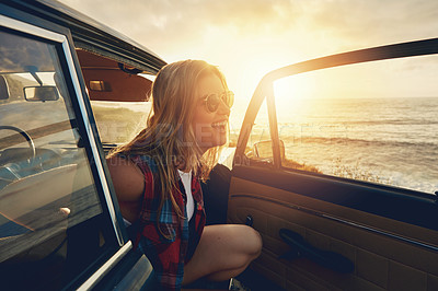 Buy stock photo Woman, sunset and beach road trip by car door with smile, freedom and happiness for summer vacation. Happy gen z girl, suv and sunglasses for sunshine, outdoor adventure or holiday by waves on travel