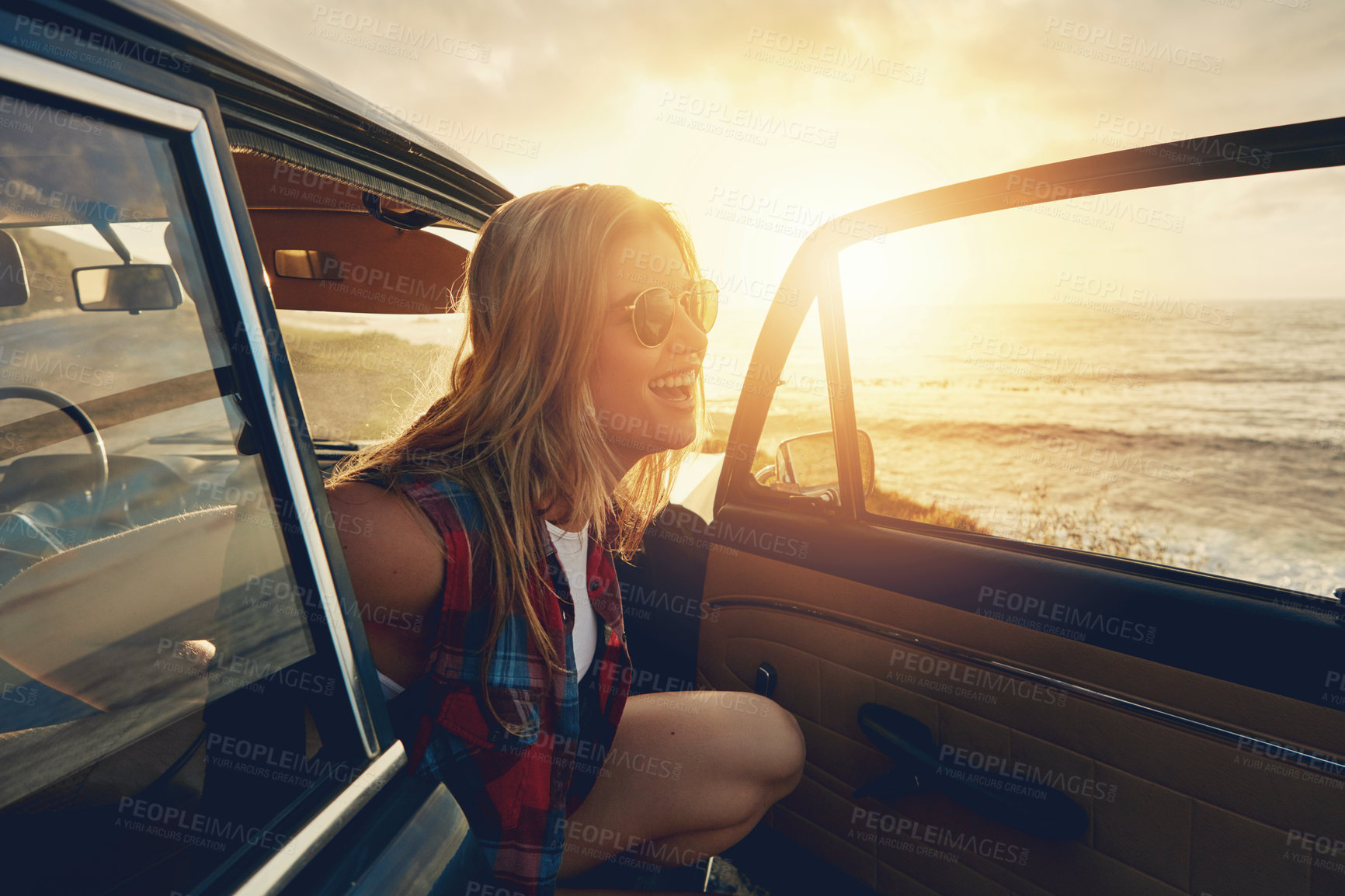 Buy stock photo Woman, sunset and beach road trip by car door with smile, freedom and happiness for summer vacation. Happy gen z girl, suv and sunglasses for sunshine, outdoor adventure or holiday by waves on travel