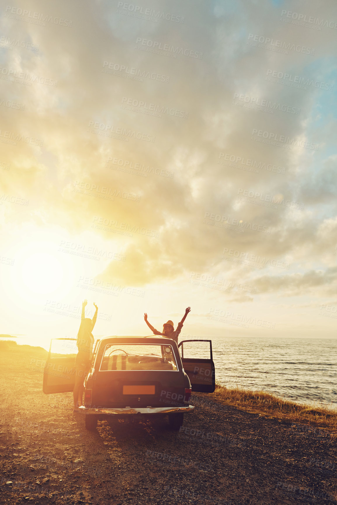 Buy stock photo Travel, car and couple of friends with sunset road trip, journey and freedom for summer holiday celebration. Celebrate, vintage and retro women rear with transport for adventure, parking and ocean