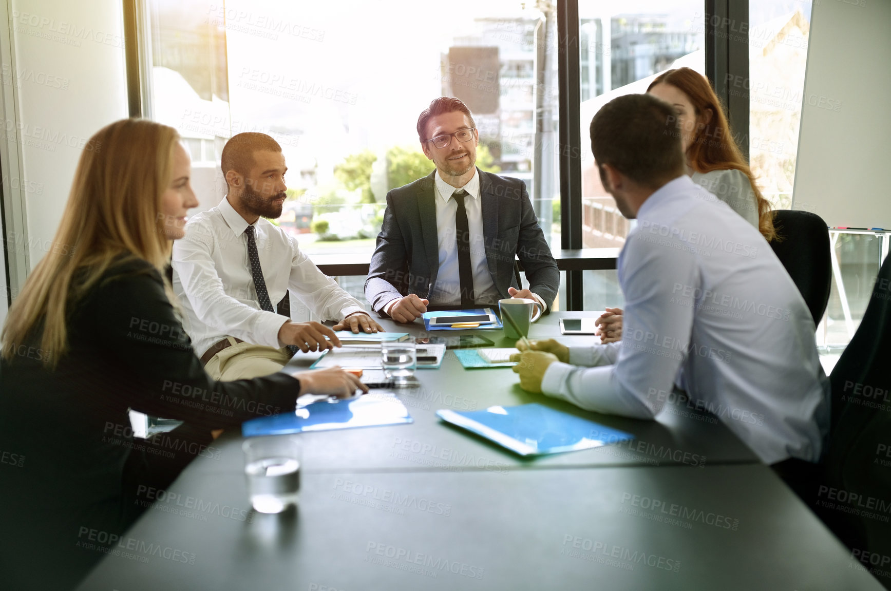 Buy stock photo Business people, group and meeting for discussion, brainstorming or planning in office. Team, manager and collaboration in conference room with financial executive for profit update or sales proposal