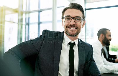 Buy stock photo Portrait of a businessman having a formal meeting in a boardroom