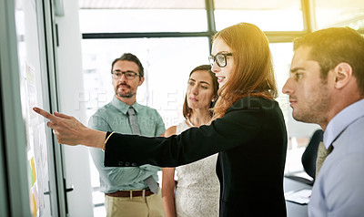 Buy stock photo Woman, glass wall or business people in training for brainstorming ideas, meeting or teamwork. Learning, pointing or staff in office discussion for solution, planning or project in creative agency