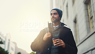 Buy stock photo Shot of a fashionable young man out in the city