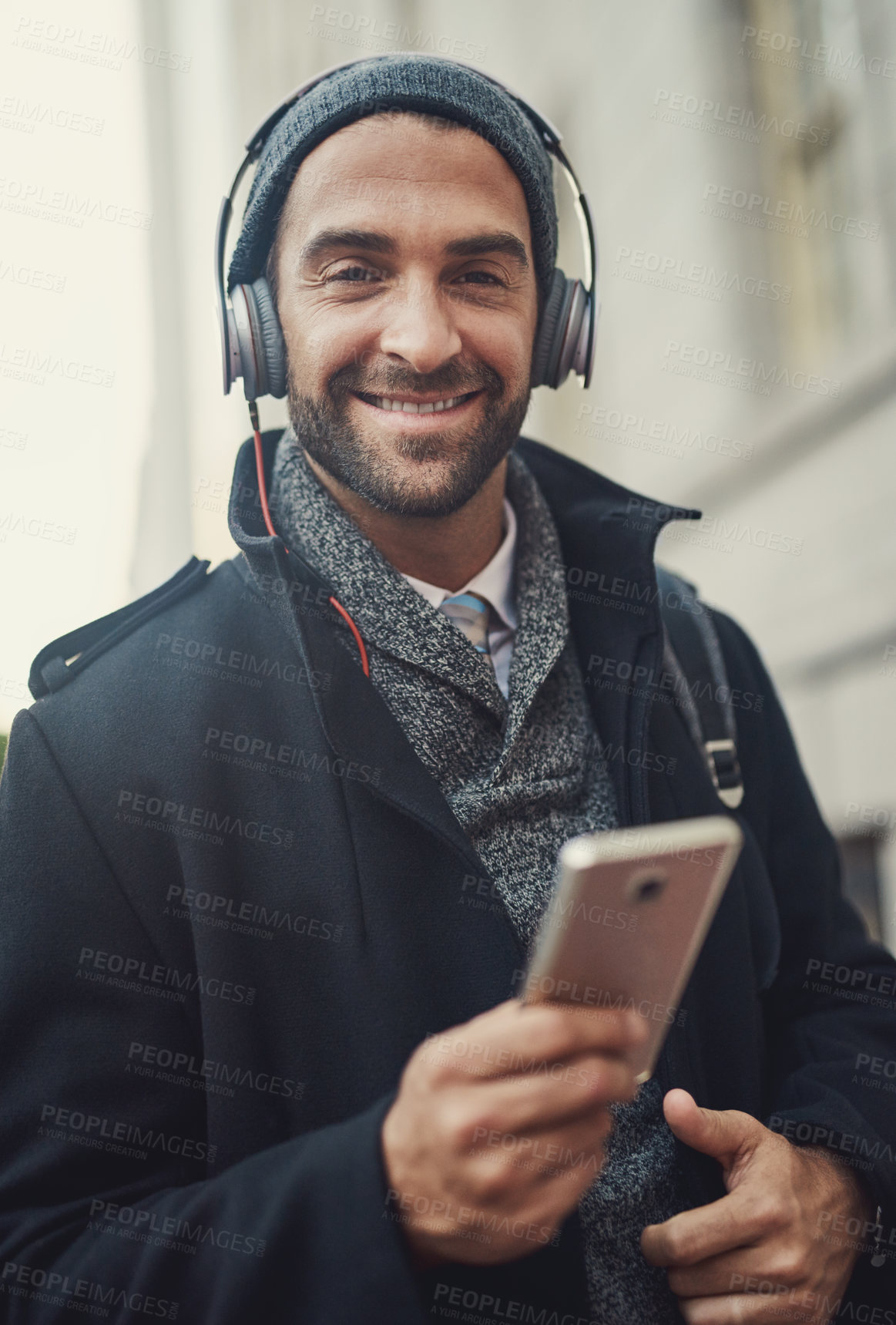 Buy stock photo City, phone and portrait of happy man with headphones for podcast and jazz to travel on work commute in winter. Mobile, face and person streaming audio, music or radio or online subscription outdoor