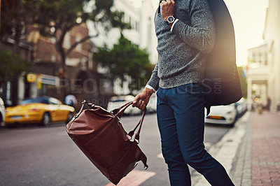 Buy stock photo Cropped shot of a fashionable young man out in the city